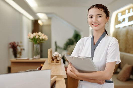 Staff member holding a tablet in a salon