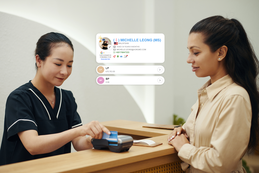 Two women discussing digital loyalty programs at a salon counter.